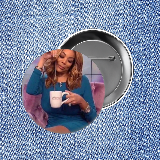 A woman in a blue dress is shown holding a coffee mug, with a button featuring the word "Wendy" visible in the background.